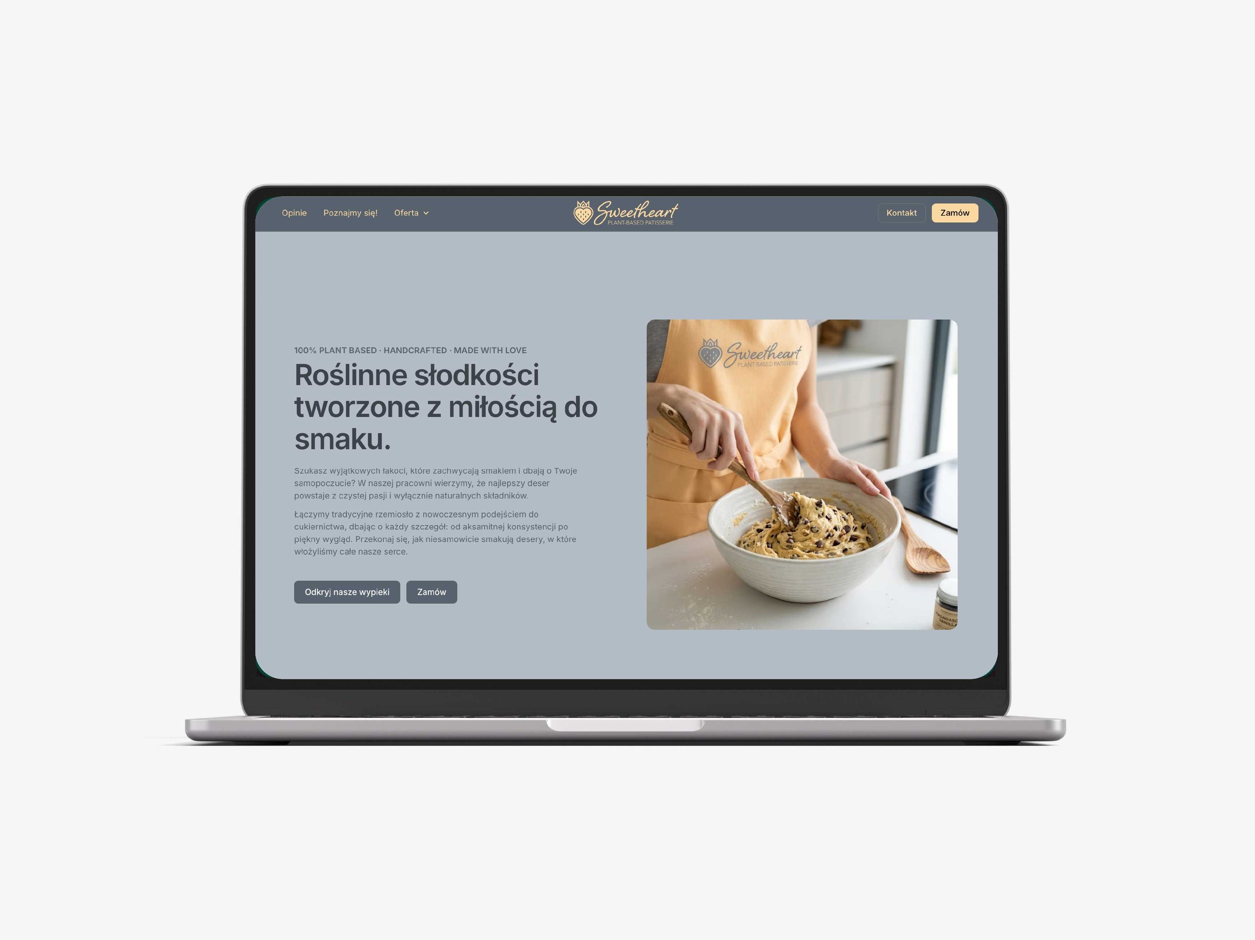 Laptop displaying a Sweetheart plant-based patisserie website with Polish text and a baking photo.